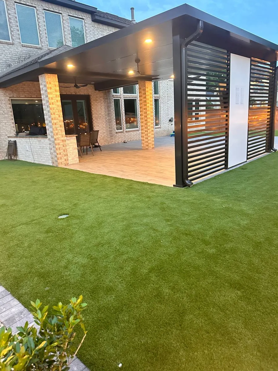 Lush artificial turf backyard installation Houston TX