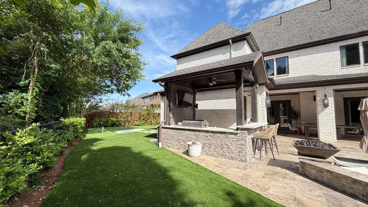 Complete outdoor living space with pool pergola and seating area in Houston TX