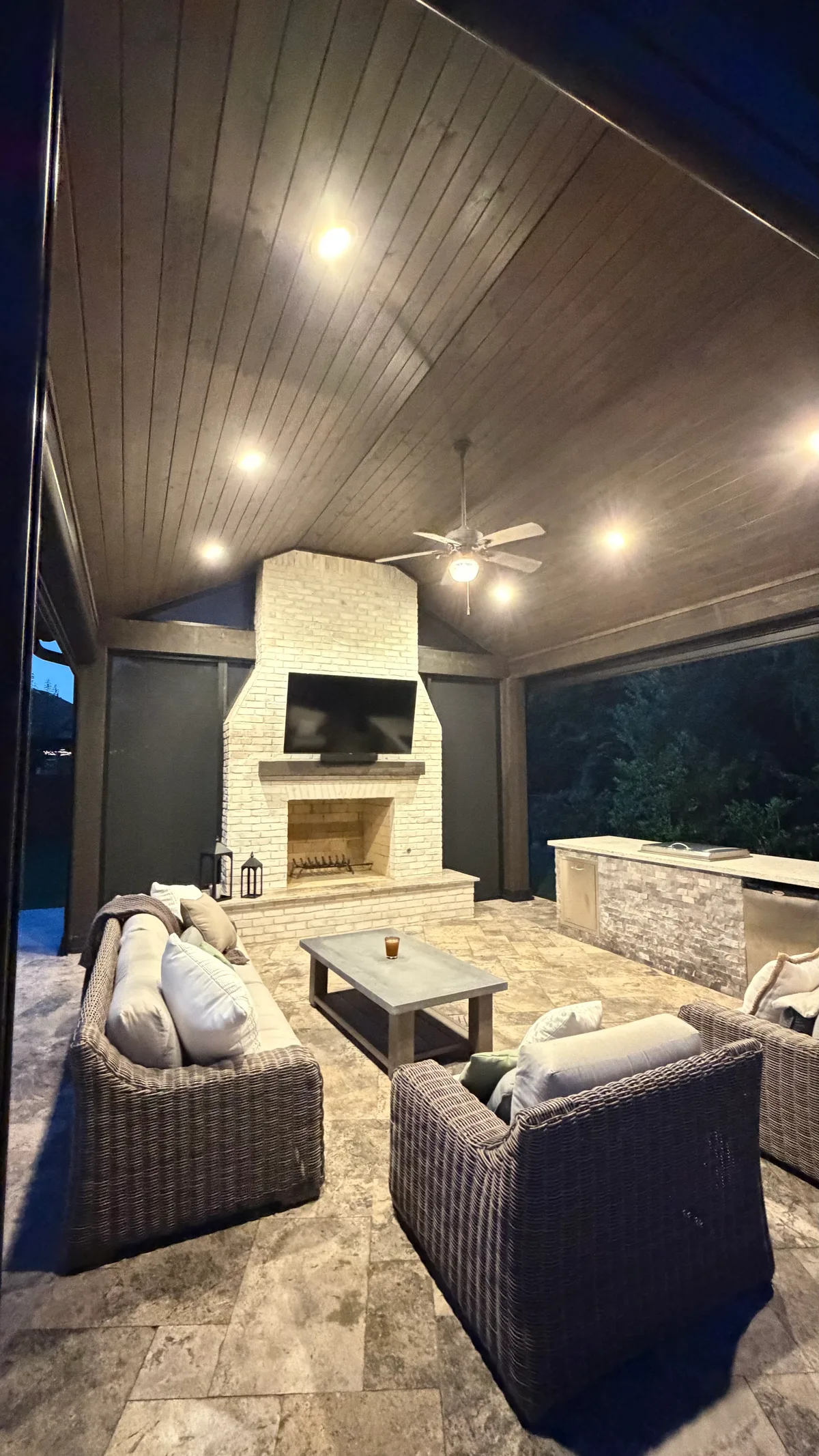 Fire bowl and outdoor living space at dusk in Houston TX