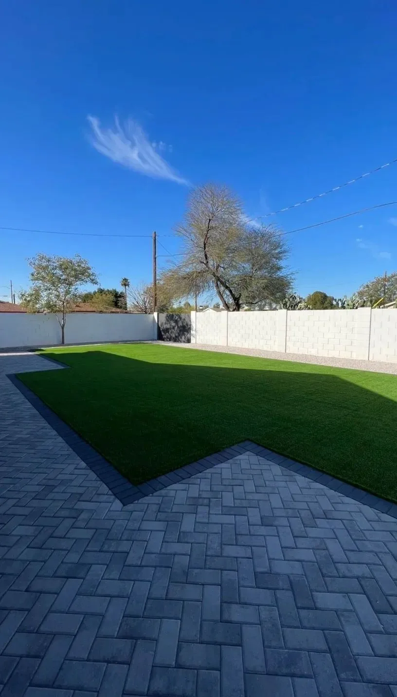 custom paver patio installation in Houston TX backyard
