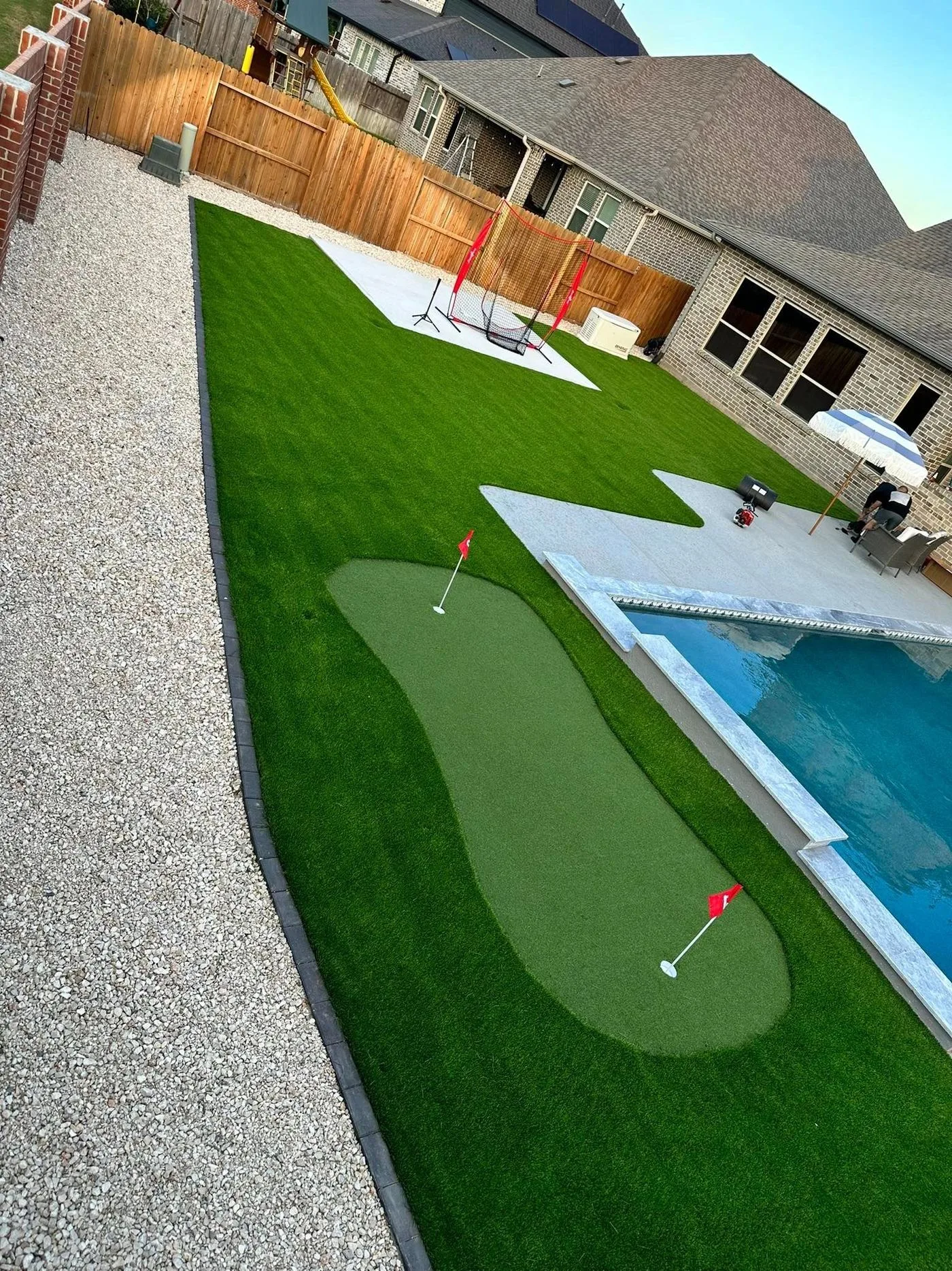 paver pool surround installation in Houston TX backyard